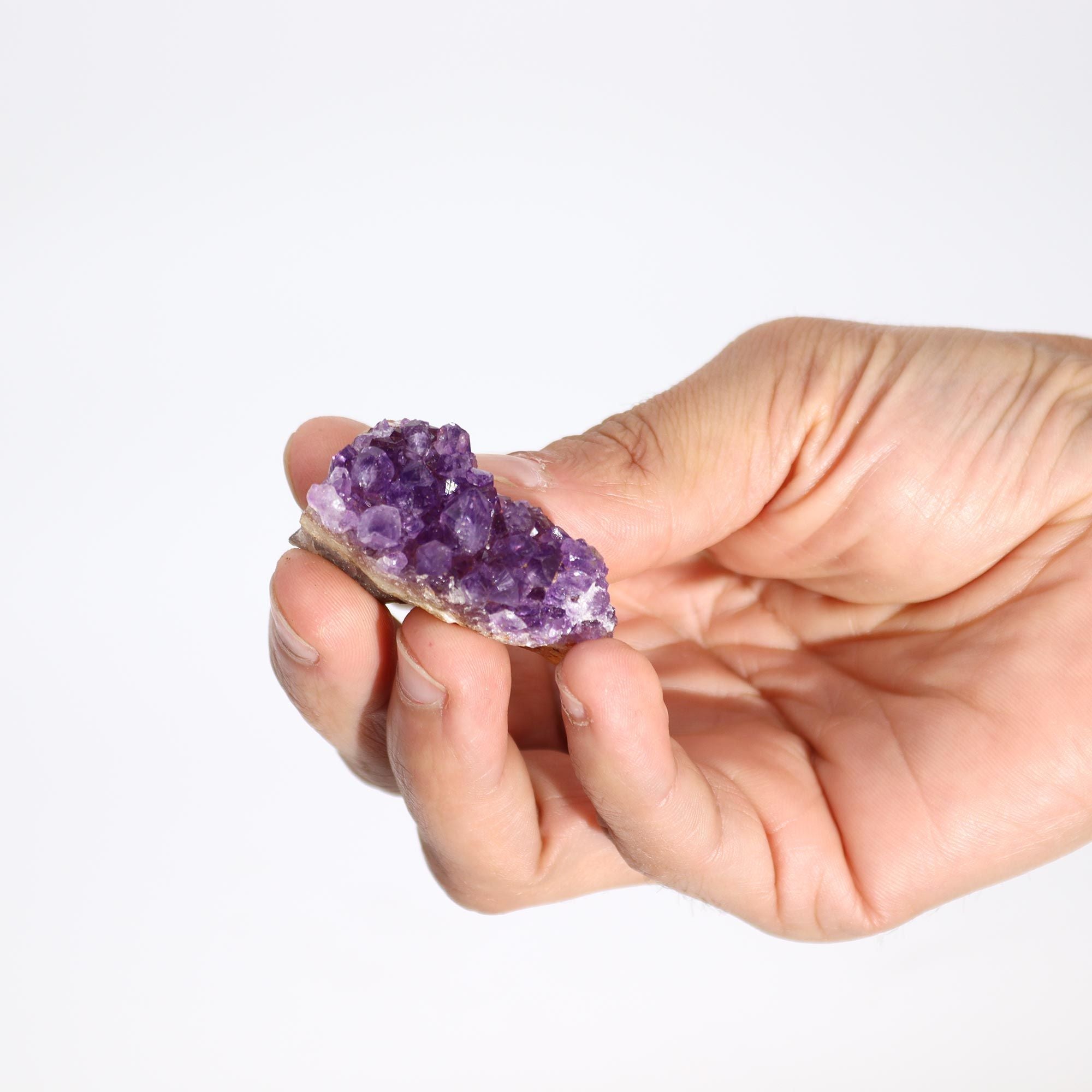 Kleine natürliche hochgradige Amethystdruse